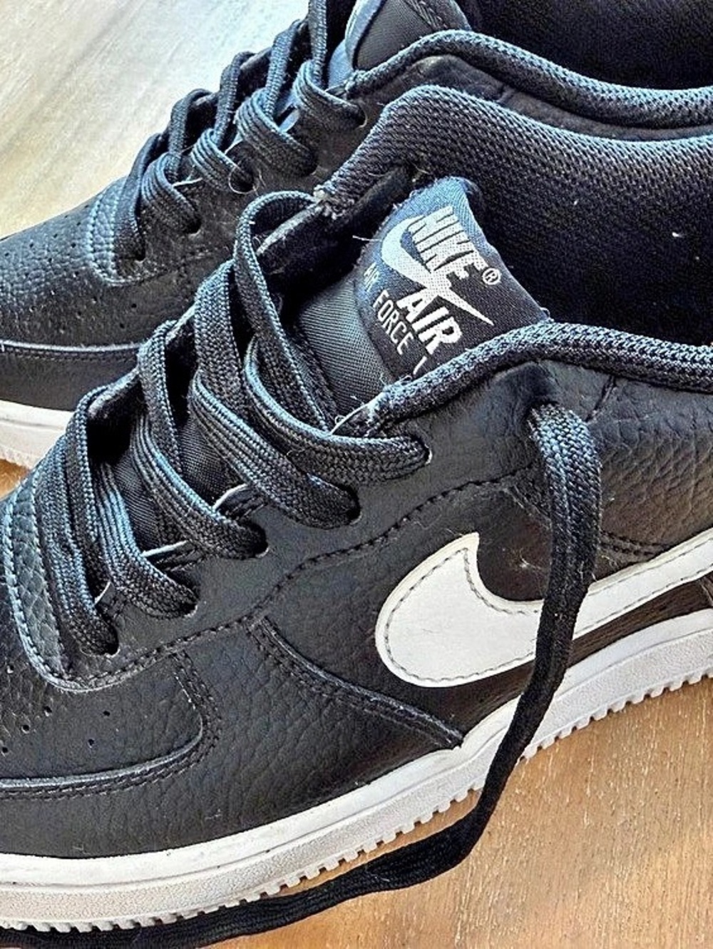 Nike Air Force 1 Low sneakers in a distinct Black/White colorway.